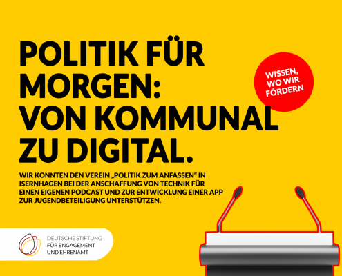 Neben einem Rednerpult steht: Politik für morgen: von kommunal zu digital